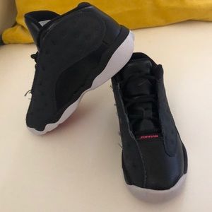 Black and white kid Jordans